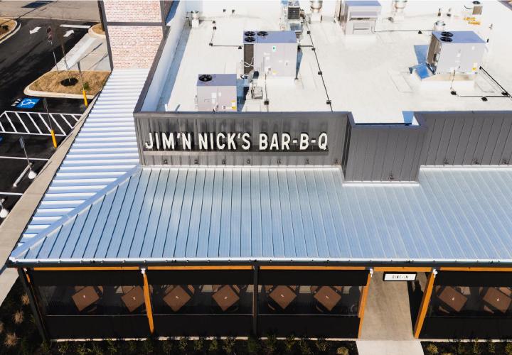 Jim 'n Nicks BBQ Restaurant Roof | Flat Roofing | Low Slope Roofing | Metal Roofing | Commercial Standing Seam Metal Roof | Commercial Roofing Solutions | Bulloch County Commercial Roofers | New Construction Commercial Roofer