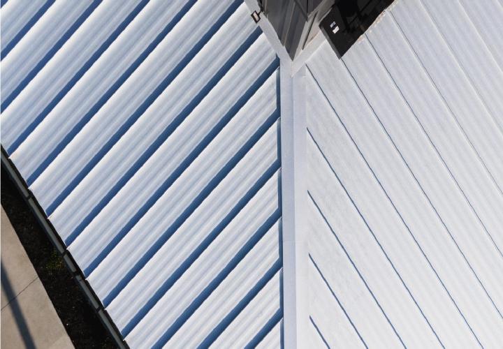 Jim 'n Nicks BBQ Restaurant Roof | Flat Roofing | Low Slope Roofing | Metal Roofing | Commercial Standing Seam Metal Roof | Commercial Roofing Solutions | Bulloch County Commercial Roofers | New Construction Commercial Roofer